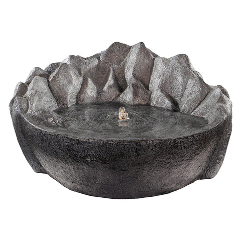 Rustic mountain stone fountain