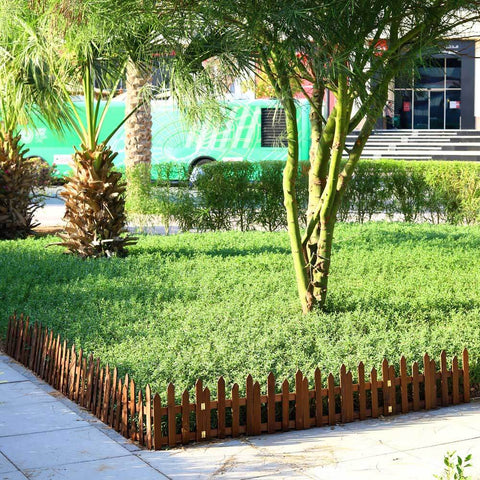 Wooden garden picket fence