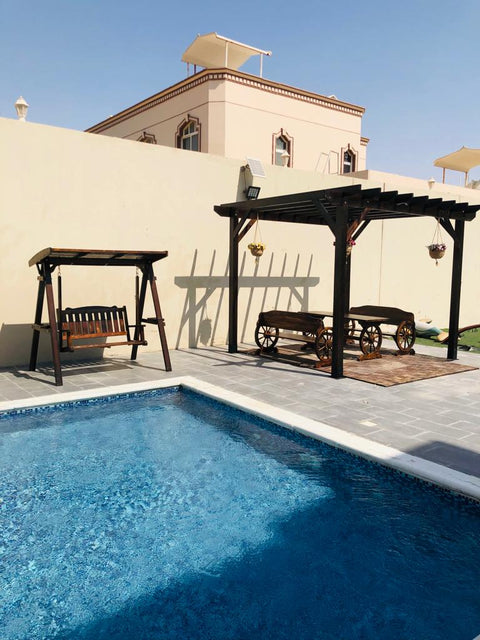 Poolside Bliss with Wooden Swing & Pergola Seating