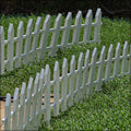 These white plastic garden fence panels provide a durable and stylish solution for protecting your garden.