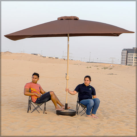 This rectangular C-Hopetree Outdoor Umbrella provides optimal shade and protection from the sun's rays.