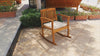 Enjoy a peaceful day in your backyard with this acacia wood Rocking Chair.