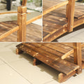 This Wooden Arch Footbridge is a charming addition to any garden