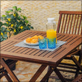 Crafted from eucalyptus wood with oil finishing, this Wooden Table and Chair Set is perfect for outdoor dining. 