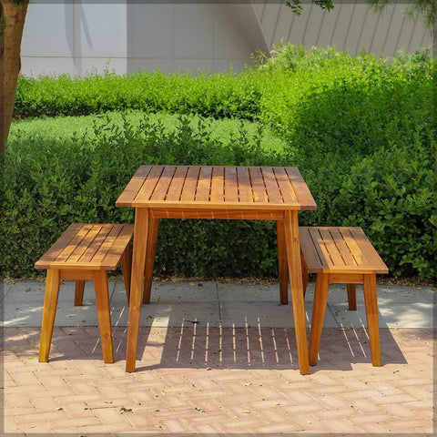 Crafted from durable acacia wood, this outdoor table and bench set is built to withstand the elements. Perfect for al fresco dining.